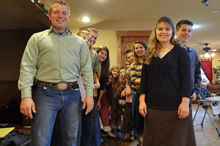 The Bates kids pose according to height and age order.