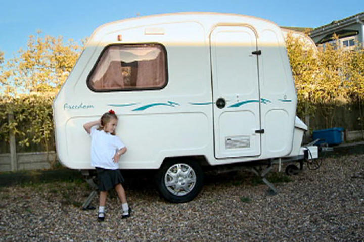 It may seem small to us, but to this gypsy girl, it's home!