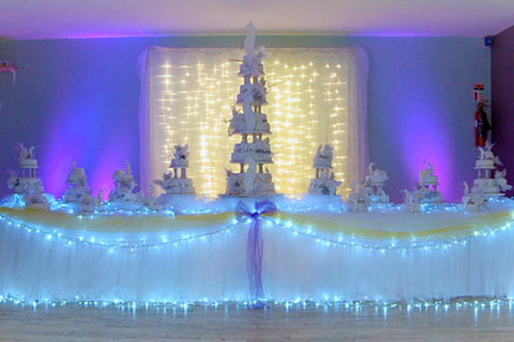 This gypsy bride's wedding cake takes the, uh, cake. She's got a whole table full of confections!