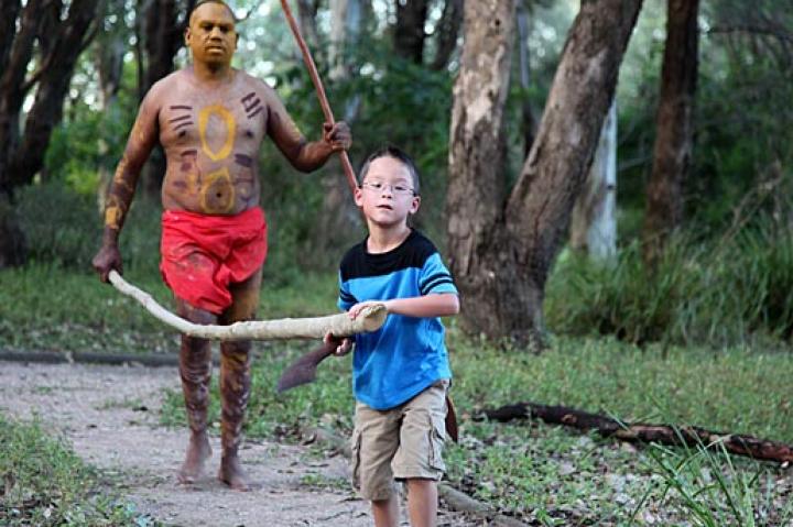 Aaden lends a hand at Aboriginal Village in Muru Mittigar.