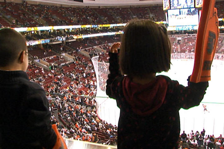 Leah and Aaden Gosselin cheer the Philadelphia Flyers.
