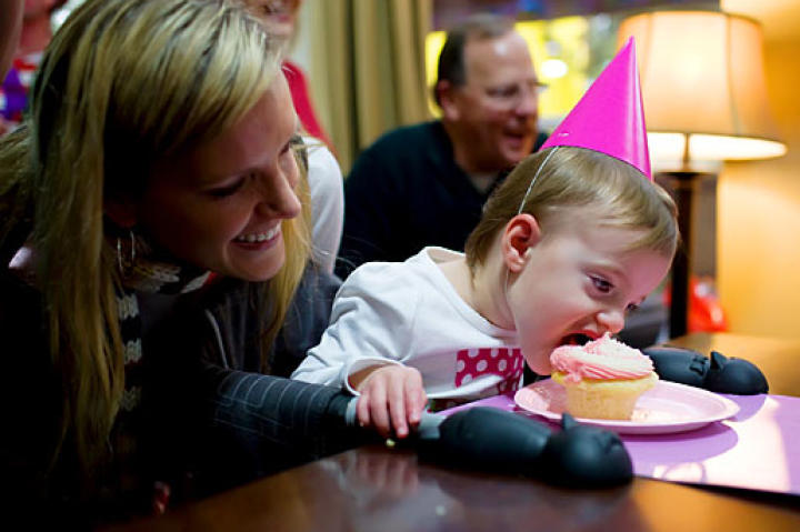Brooklyn dives into her birthday cupcake.