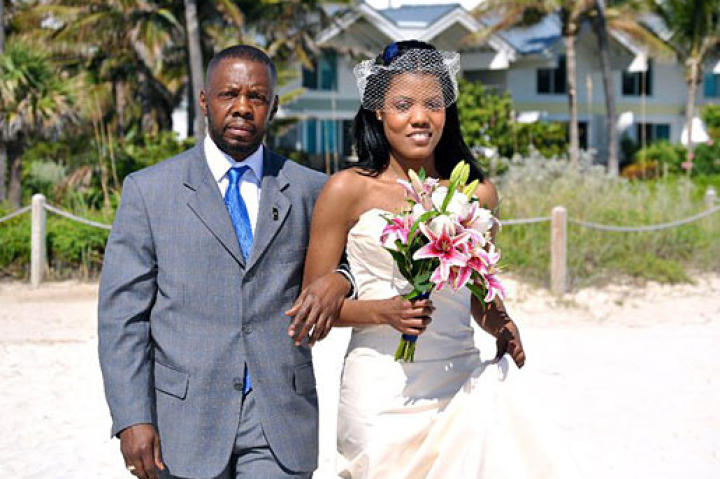 Regina White walks down the aisle.