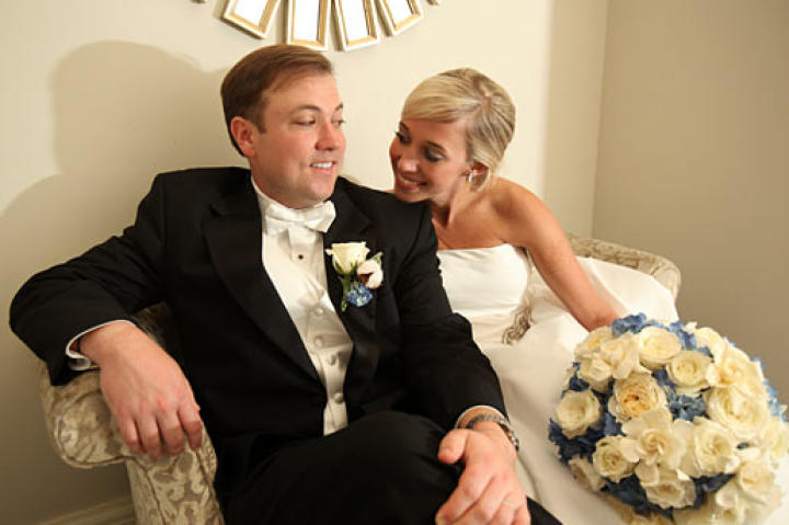 The bride and groom share a private moment.