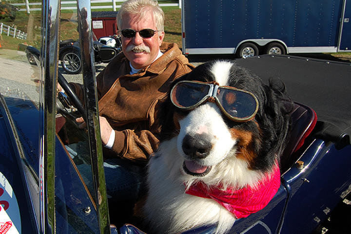 Wayne with dog in Bentely as seen on Chasing Classic Cars.