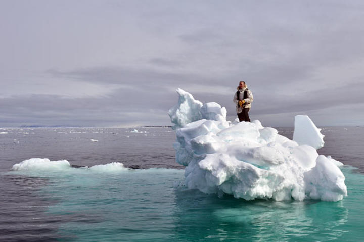 Gordon Buchanan standing on an iceberg looking for Lyr
