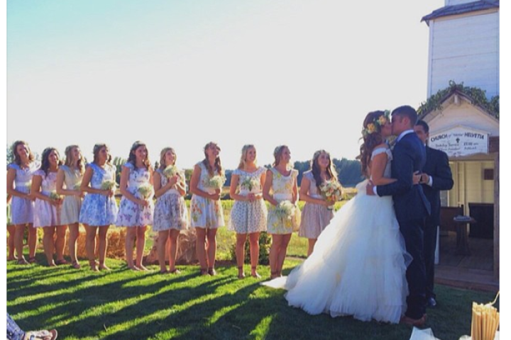 A lovely shot of the couple's first kiss as husband and wife. Watch this