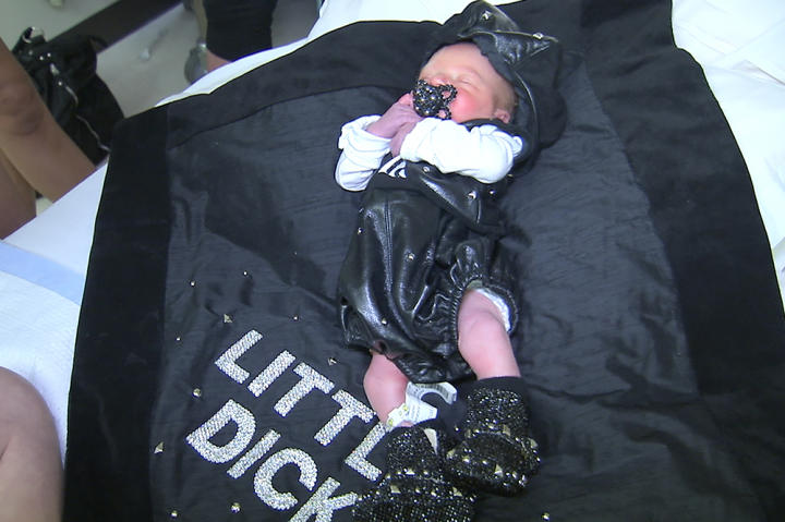 Baby Richard proves you're never too young to wear bling.