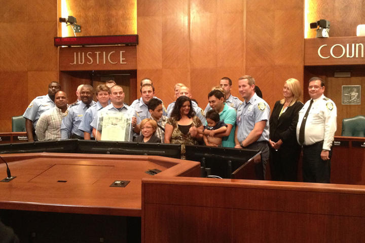 Jen and her coworkers are honored with an award, given by the city of Houston for a course they put together for the hospital.