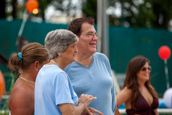 Roy and Peggy watch the festivities.