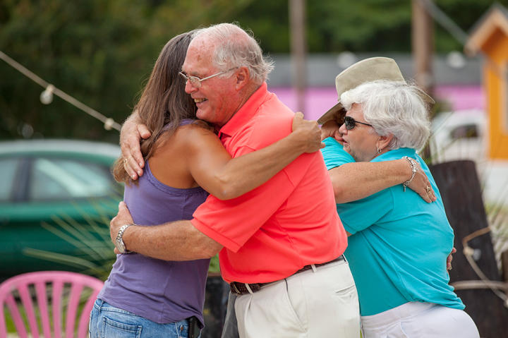 Cecil gives Jeana a hug goodbye.
