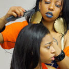 The girls have their hair and makeup styled before competition begins.