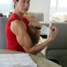 Justin shows off the implants in his arms.
