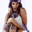 Cindy Crawford poses with only a cat to hide her naked body as part of the People for the Ethical Treatment of Animals (PETA) anti-fur campaign in 1994.