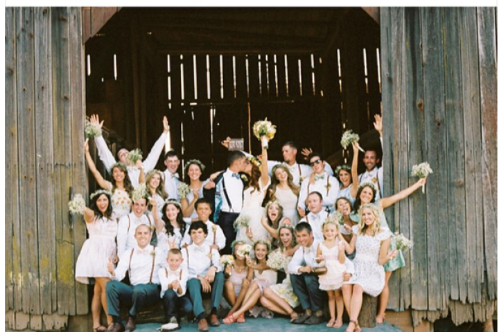 The entire bridal party -- 12 bridesmaids and 11 groomsmen -- show their love for Audrey and Jeremy in this happy snapshot. If you missed the wedding episode,