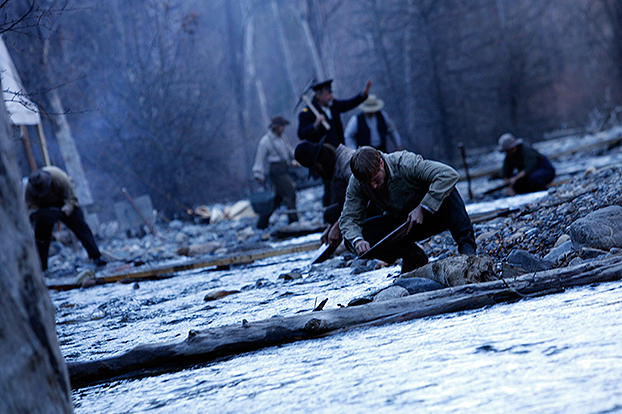 The members of Boston Company pan for gold in California.