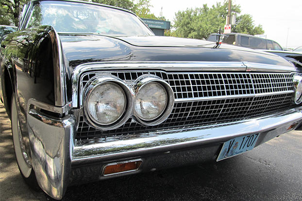 A Lincoln Continental, a replica of JFK's Presidential limousine.