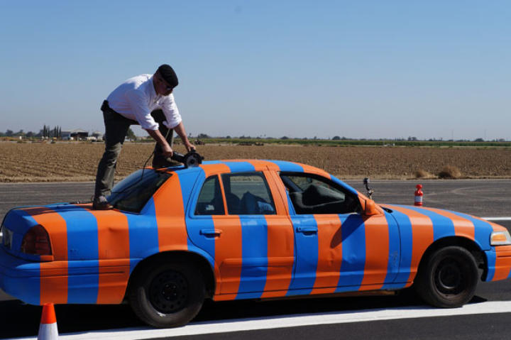 Adam always likes to paint "silly-colored" stripes on the cars used on