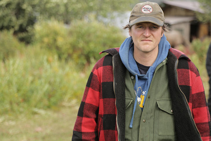Atz Lee Kilcher gives a serious look to the camera, as he and his father, Atz, continue on the trail in search of a moose.