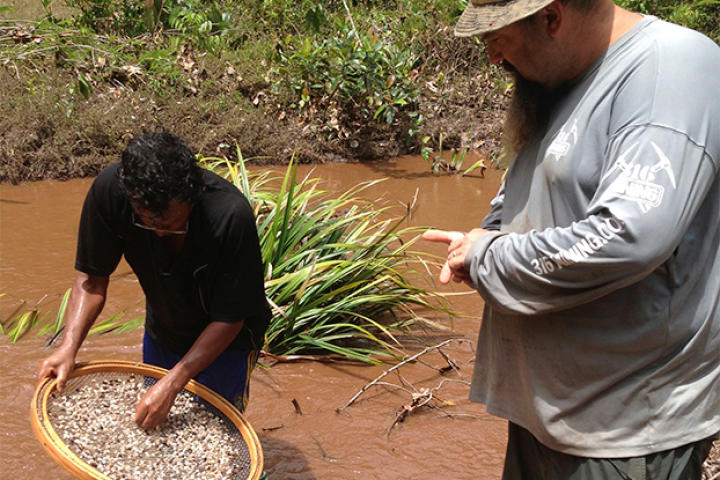 Todd Hoffman helping sift through rock.