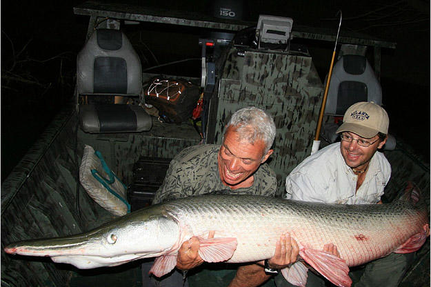 This alligator gar in River Monsters were caught in the Trinity River in Texas. The river, which flows into the Gulf of Mexico, is winding and muddy with lots of dead wood.