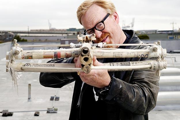 Adam Savage poses with the paper crossbow on Aug. 14, 2007.
