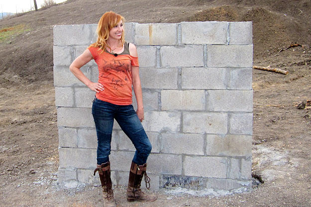 A concrete wall helps Kari Byron determine just what is truly bomb proof.