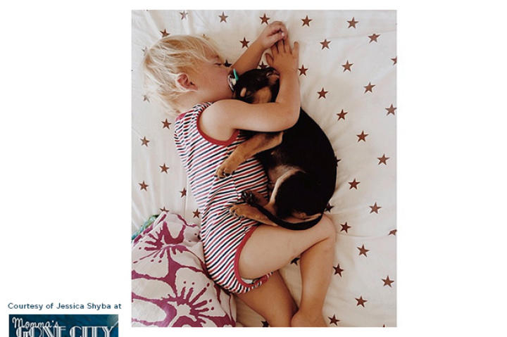 Beau's mother captured these adorable images of the two cuddling in bed.
