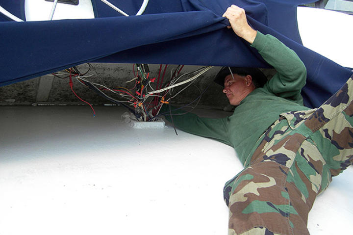 Turtleman searches for critters in Heather Sheperd’s houseboat.