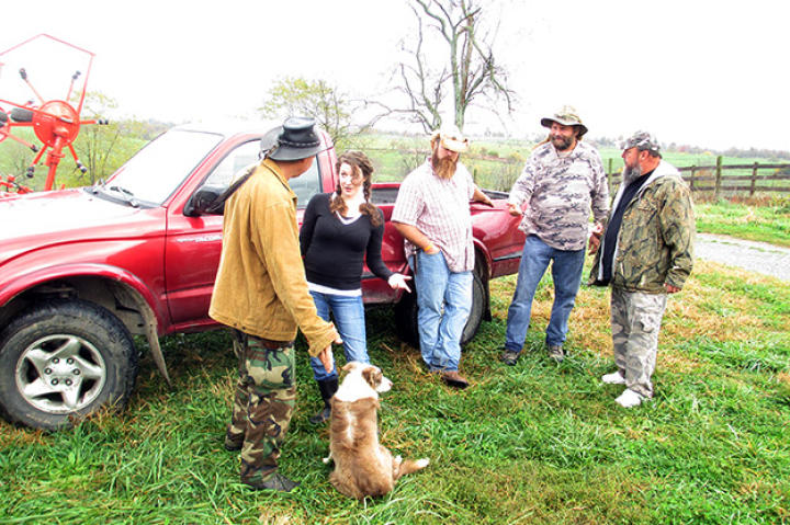 Farmer Cole Henson discusses her nuisance call with Ernie Brown, Jr., the Turtleman, and his crew.