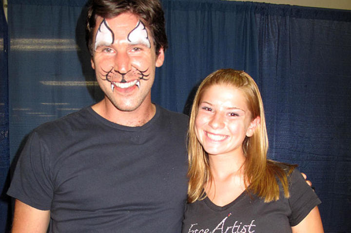John shows off his new look with a face painter.