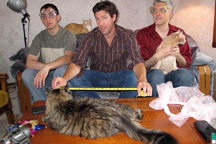 John hams again for the camera with Cat Engineers Paul Klusman and Thomas Wingard..