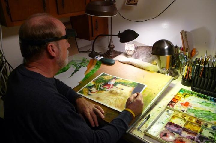 Cat Man Drew at work.