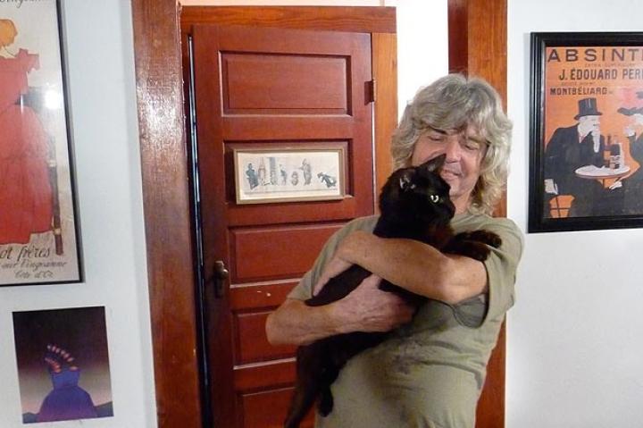 Dominique with a cat.