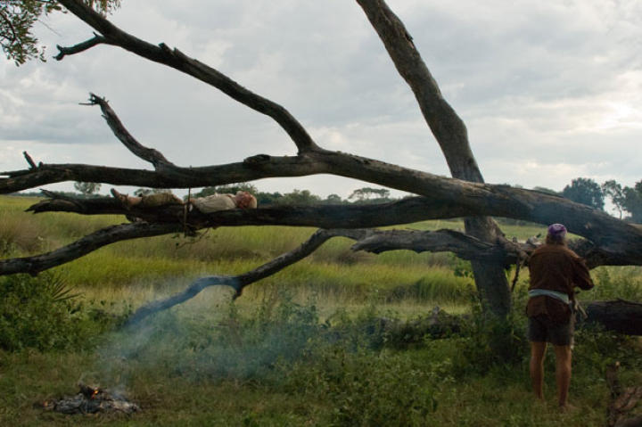 Because hippos come up on dry land at night to feed, rule number one in hippo country is to pick a roost well above ground. As a an additional defense, Dave made the fire earlier in the day using a magnifying lens from binoculars left behind for them.