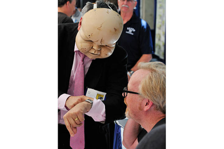 Adam Savage seems nonplussed by this awesome — but creepy — Comic Con attendee costume.