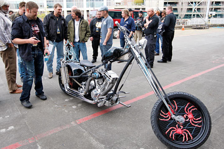 The captains, including "Wild" Bill Wichrowski, Elliot Neese, Johnathan Hillstrand (with Rick Petko) and Sig Hansen, check out OCC's Deadliest Catch Bike.