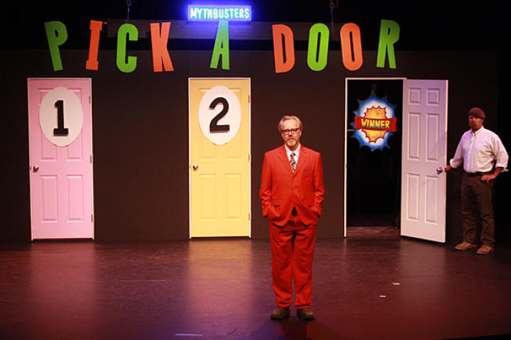 I can't write a caption for this photo, are you kidding me? Look at that saucy red suit! Clearly, this photo is from the Monty Hall Paradox shoot ... and Adam Savage looks fetching in red.