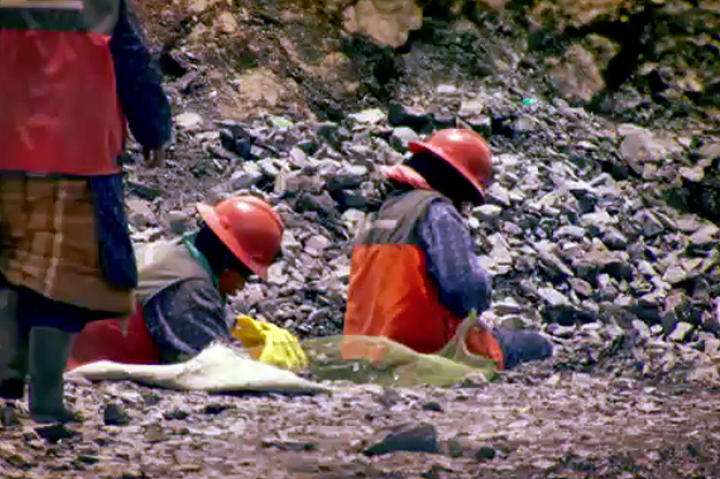 The first thing the guys notice is the headache inducing thinner air making it more difficult to breathe. Then they notice the free-for-all atmosphere of people sifting through rocks on the side of the road. It’s fast, crowded and dirty.
