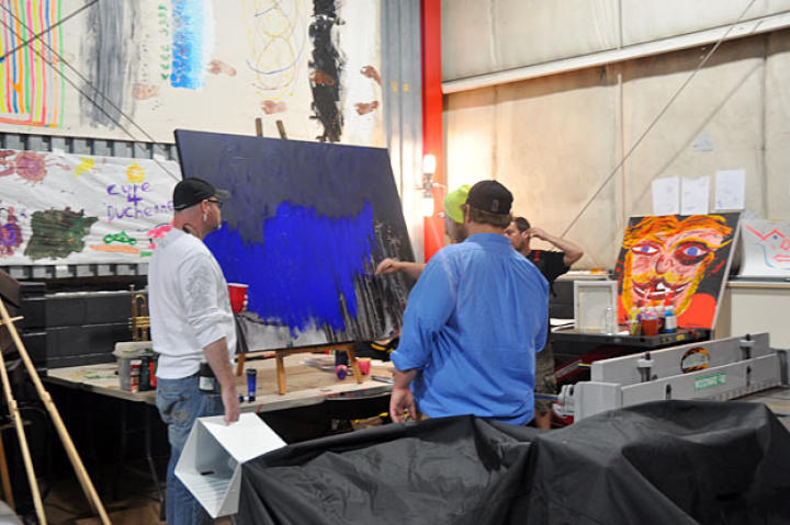 American Chopper producer Joel Raatz checks in with Mikey and Mike Randazzo on the shooting schedule for the day.