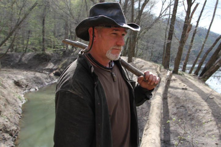 One of the first tools Dave makes is a basic "rabbit stick" that can be used to bring down small mammals. This ancient hunting tool is no more than a one to two inch thick branch about the length of your arm with a boomerang like elbow. With a little practice, the user has a better than average chance of bagging a squirrel or rabbit.
