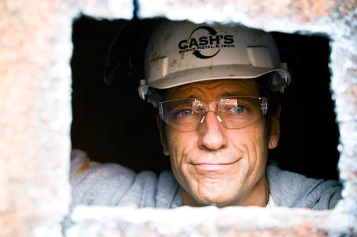 Mike Rowe peers out at the lucky photographer from the barge he was helping to demolish in St. Louis.