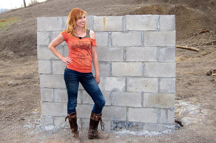 A concrete wall helps Kari Byron determine just what is truly bomb proof.