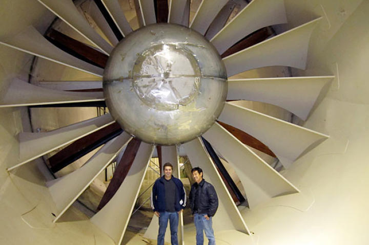 Tory Belleci and Grant Imahara pose in front of NASA's icing research tunnel during the testing of the "Blue Ice" myth. (Yes, we said "icing research tunnel." It's used to develop, test, and certify methods to prevent ice buildup on aircraft, so it's really, really important as well as cool-looking.)