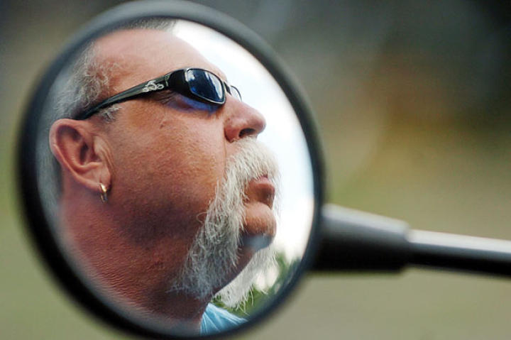 Paul Teutul Sr. as reflected in his side-view mirror in 2005.