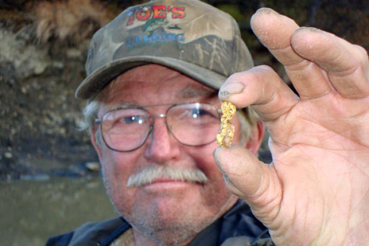 "Dakota" Fred Hurt is a seasoned gold miner and long-time friend of claim owner Earle Foster who knows how to find a nugget or two.
