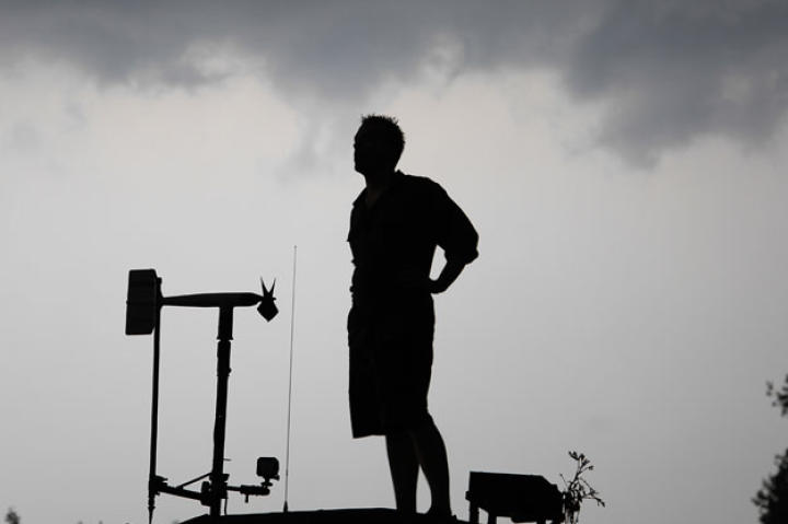 Reed surveys the tornado battleground from one of his favorite perches.