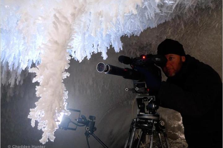 Filming in an ice cave beneath Antarctica's Mount Erebus.