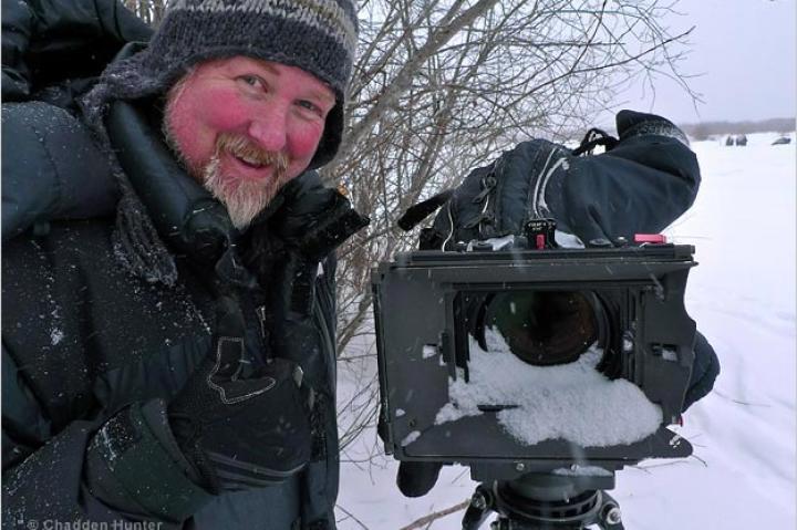 Filming bison and wolves in the Canadian High Arctic.