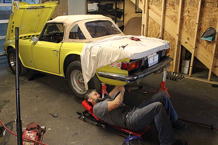 Keith working on the TR6.